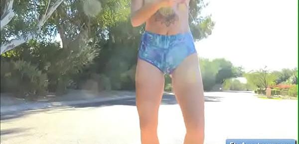  Young blonde amateur girl Arya running naked in the street and finger herself outdoors